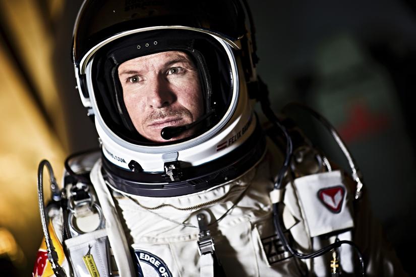 Felix Baumgartner, a white man, wearing a high-altitude flight suit.