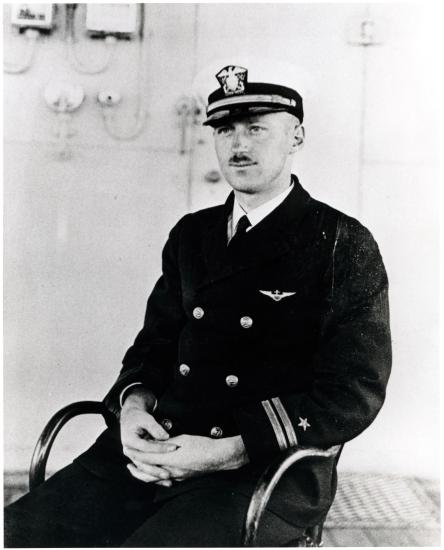 Alfred M. Pride, a white man, sits for a portrait in his U.S. Navy uniform.