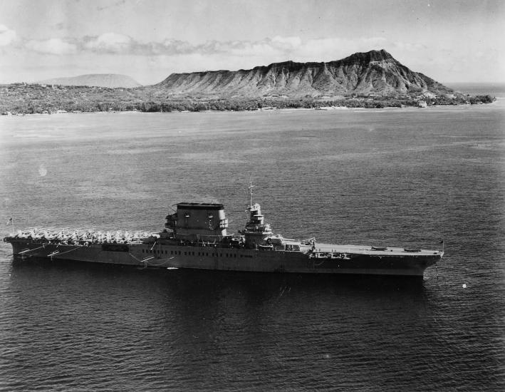 The Lexington lies at anchor off Diamond Head