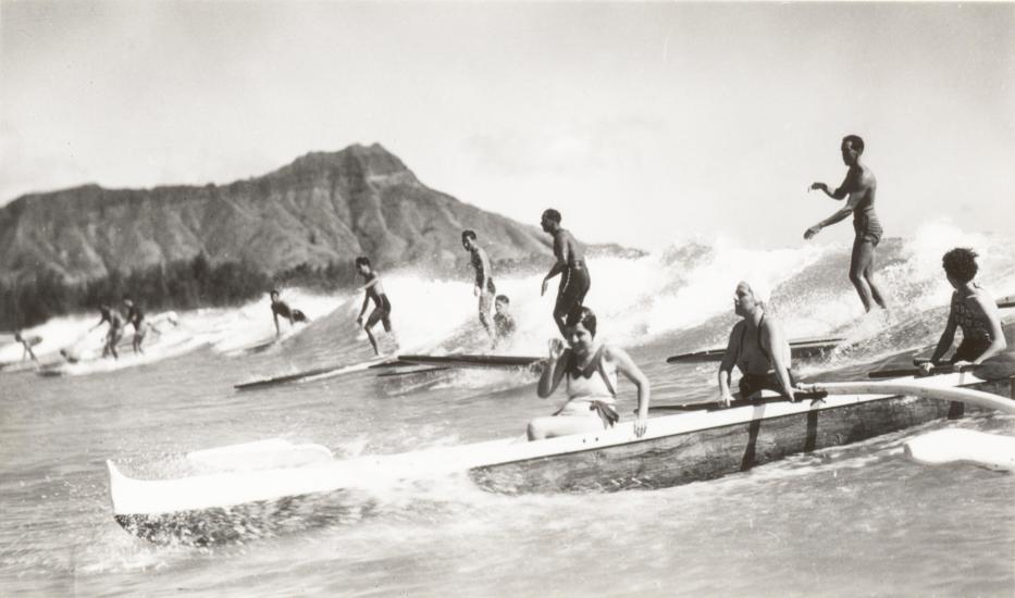 Outrigger Canoe and Surfers