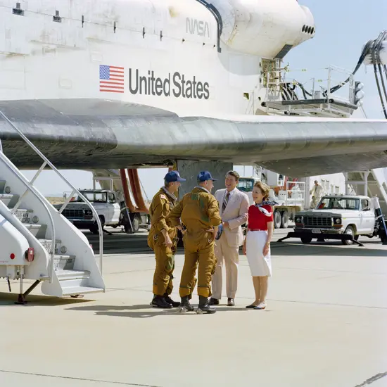Two members of the Space Shuttle STS-4 crew meet with President Ronald Reagan and First Lady Reagan following the shuttle's landing.