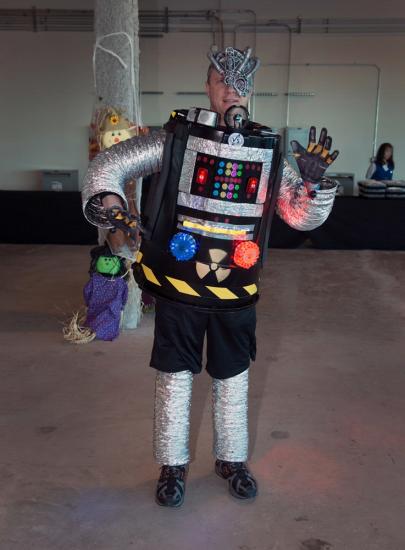 A Museum visitor wears a robot costume at the Museum's annual Halloween event.