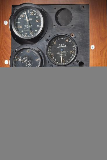 Three measuring instruments on a panel used during the historic T-2 flight. Panel has been removed from the aircraft.