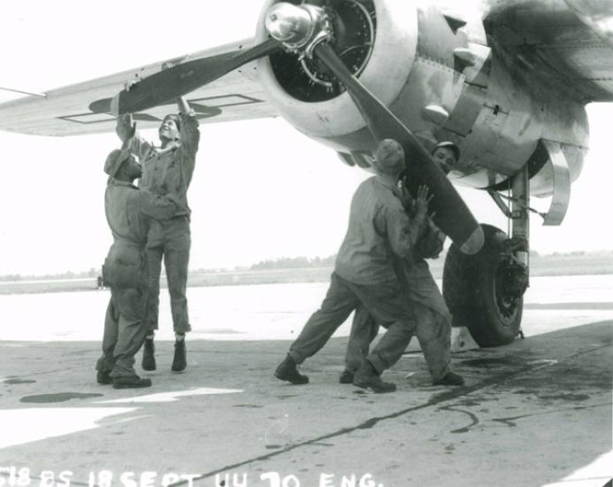 Technicians prepare B-25 