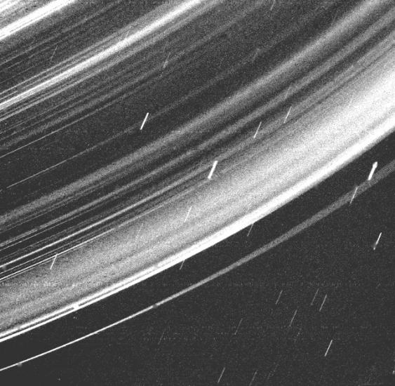 A close-up view of the ring system surrounding the core of Uranus.