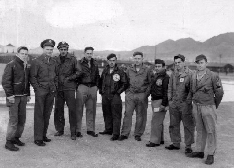 A group of U.S. Air Force soldiers who fought during World War II stand together.