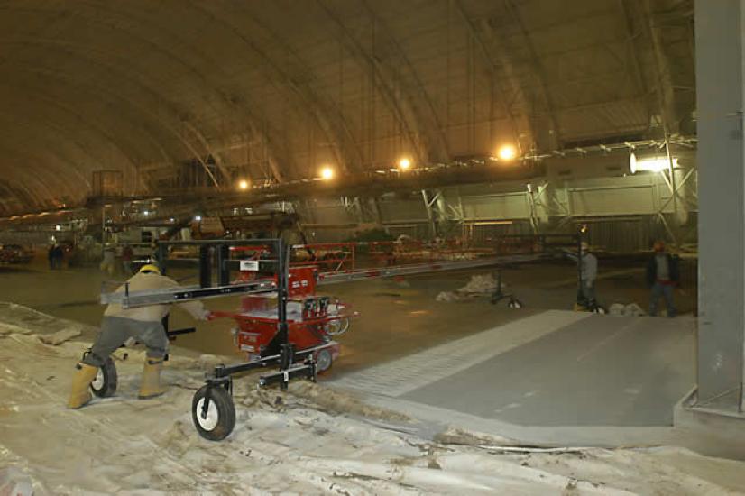 Preparing the floor of the Aviation Hangar