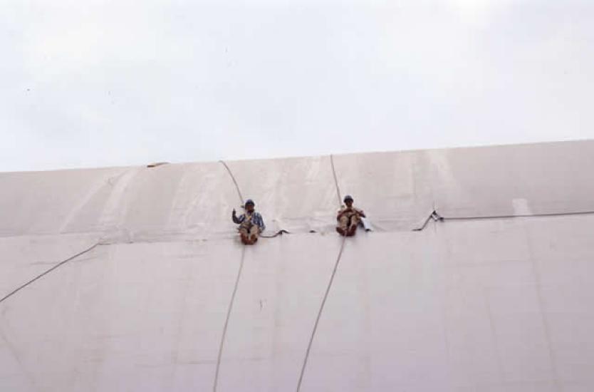 Udvar-Hazy Center roof workers installing Hypalon