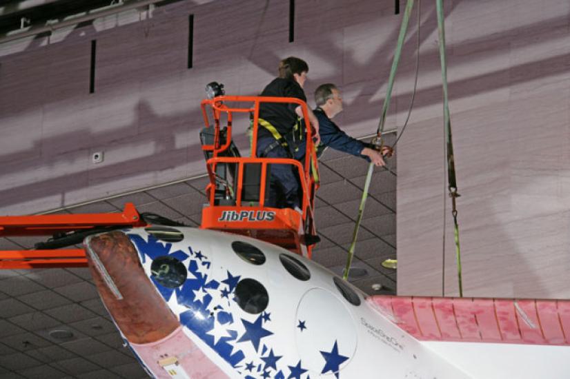 SpaceShipOne and Museum Specialists in cherry picker