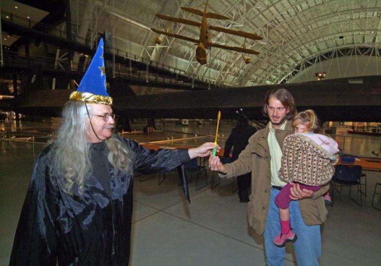 A Wizard/Museum Curator Enchants Visitors to Air & Scare