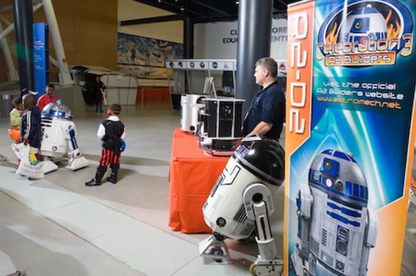 Kids Enjoy an Encounter with R2D2 at Air & Scare