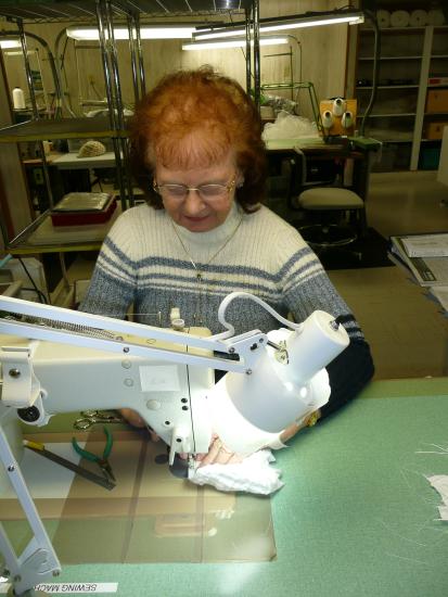 Ruth Ratledge repairing Spacesuit