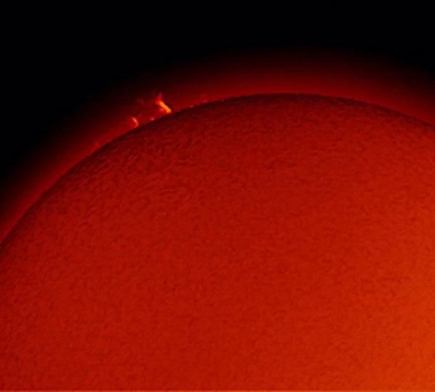 View of a prominence of plasma floating away from the Sun.