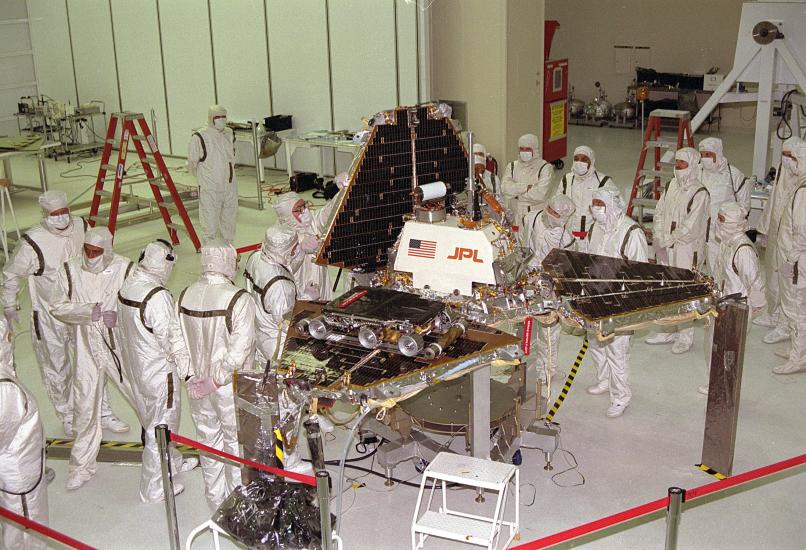 Workers in the Jet Propulsion Laboratory work to prepare the Mars Pathfinder Lander before its flight to Mars.