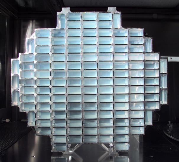 A honeycomb-like structure of rectangular aluminum cells filled with aerogel.