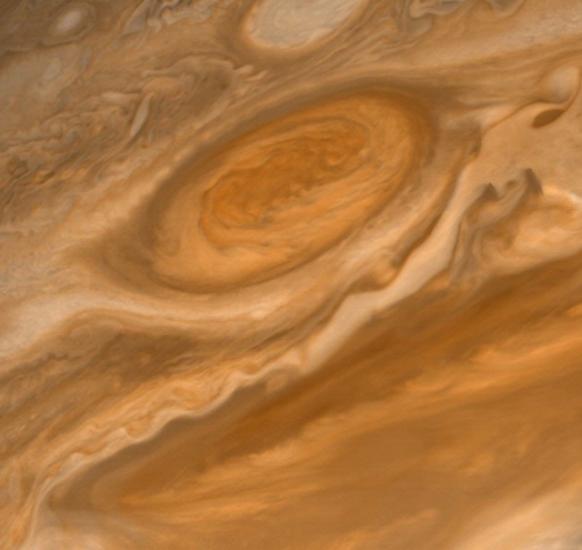 A red swirl of gases found on Jupiter slightly above the equatorial region shown as a darker line of gases.