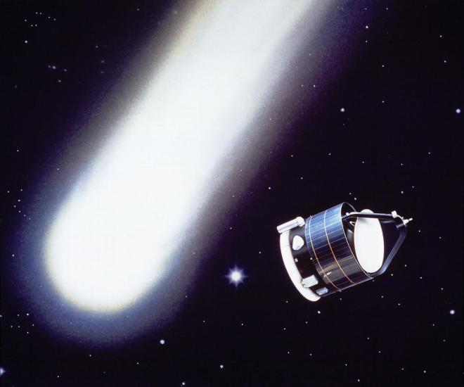 An artist's depiction of a cylindrical prism-shaped space probe passing Halley's Comet in space.