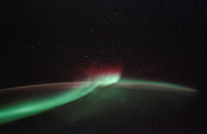 A view of the Aurora Australis, a phenomeon known as "southern lights", from the Space Shuttle Discovery above Earth.