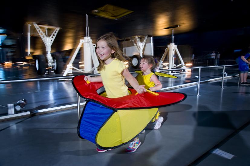 Child with an airplane costume