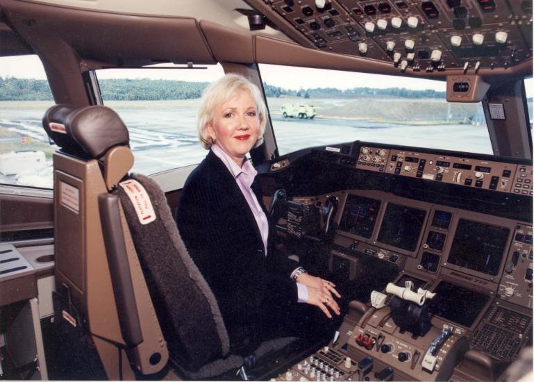 Suzanna Darcy-Hennemann in the cockpit of a plane. 