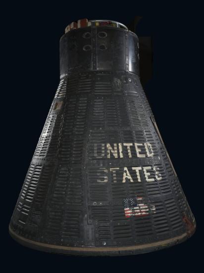 Gemini capsule with the words United States on the outside.