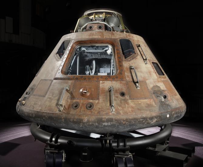 Picture of Apollo 11 Command Module on display.