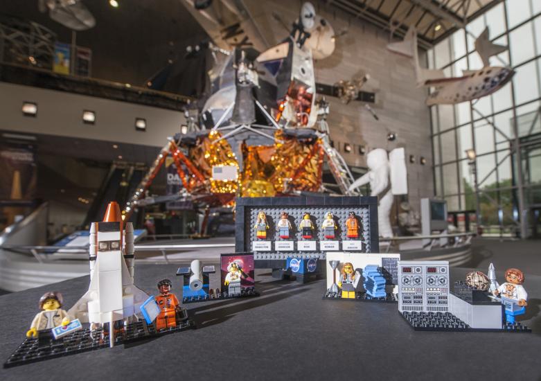 The original prototypes of the  LEGO® Ideas "Women of NASA" set displayed in front of the Apollo Lunar Module in the Boeing Milestones of Flight Hall