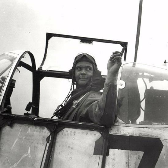 A black and white photograph of a pilot.