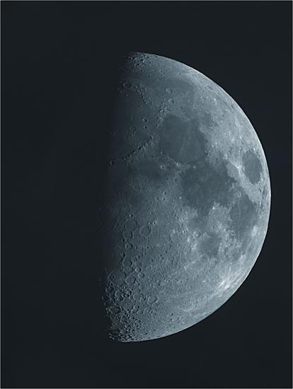 View of moon in waxing gibbous phase.