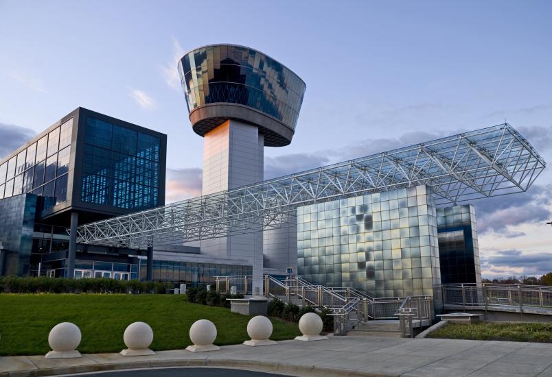 Image of the entrance of the Steven F. Udvar-Hazy Center and the Engen Observation Tower.