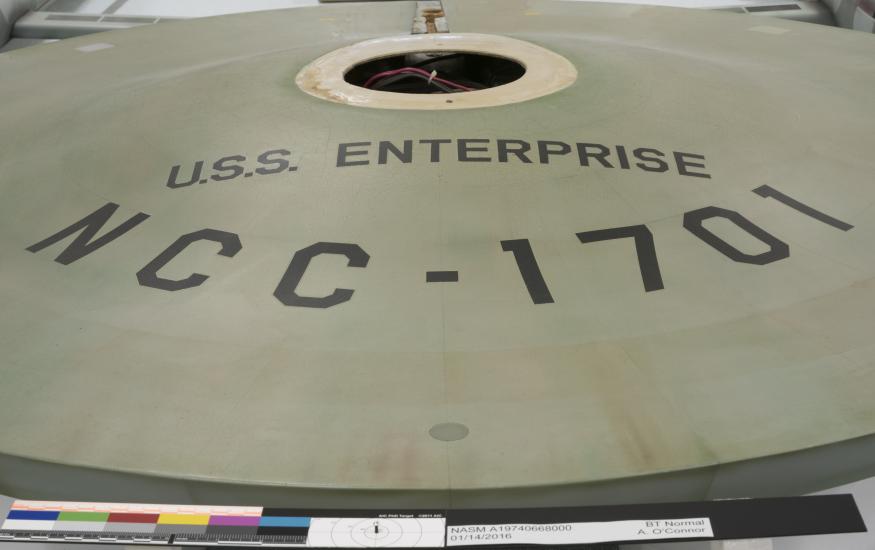 Original painted version of U.S.S. Enterprise call letters on the saucer of the U.S.S. Enterprise studio model.