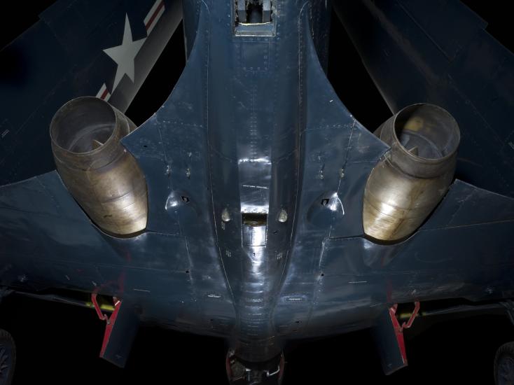 Bottom of blue McDonnell FH-1 Phantom I aircraft with two round engines attached to each wing