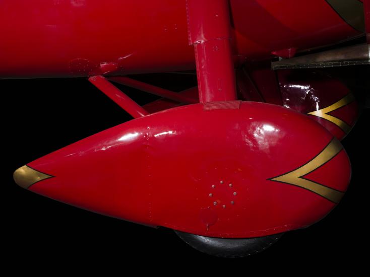 Red teardrop shaped wheel faring on Amelia Earhart Lockheed Vega 5B aircraft