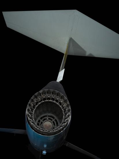 Closeup view of Lockheed F-104A Starfighter aircraft rear exhaust port with tail