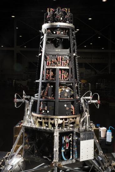 Tall black cone-shaped Ranger spacecraft with exposed wiring