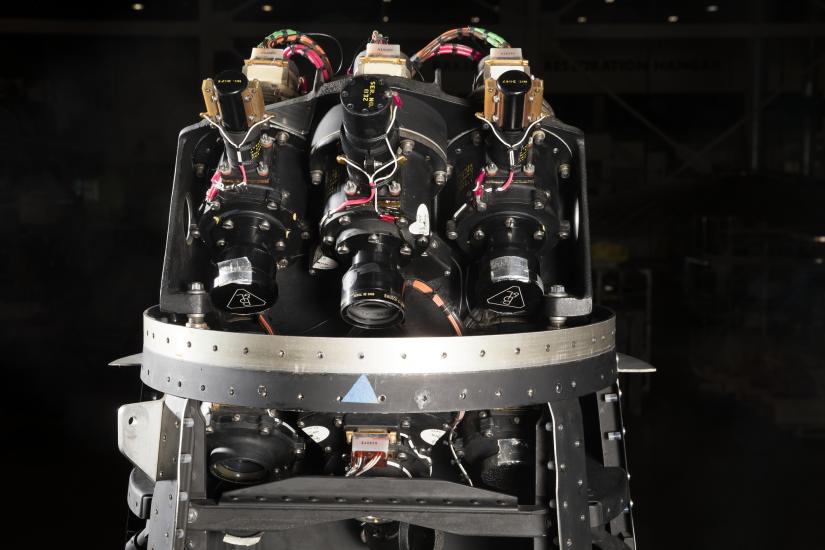 Three camera lenses on top portion of black Ranger spacecraft