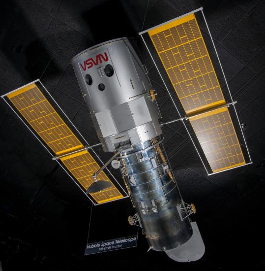 Overall view of the Hubble Space Telescope Model hanging in museum