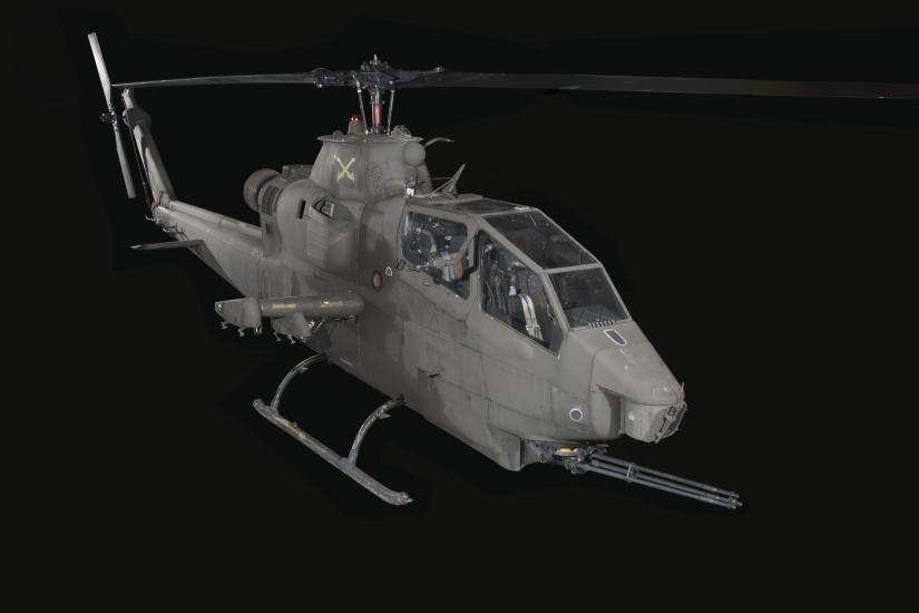 Bell AH-1F Cobra helicopter with machine gun in front