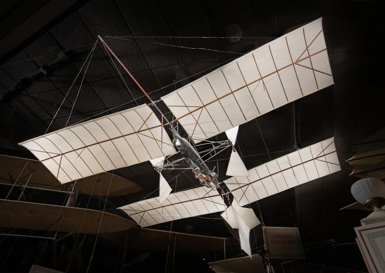 Canvas and wood Langley Aerodrome Number 5 aircraft hanging in museum