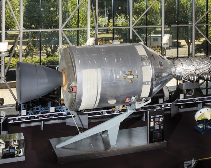 Metal conical command module with cylindrical module in museum