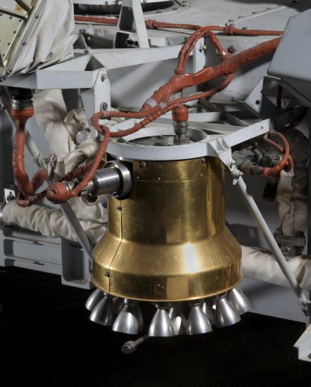 Bell-shaped engine with copper colored wiring on Viking Mars Lander