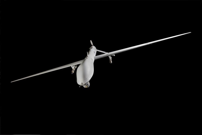 White General Atomics MQ-1L Predator A UAV hanging in museum