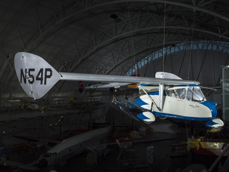 Painted blue and white roadable aircraft with a silver painted wing. 