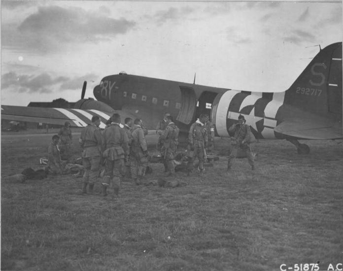 Paratroopers board a military aircraft