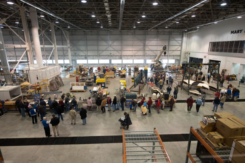 Second-floor view of Museum visitors touring the Museum's restoration hangar during an open house event.