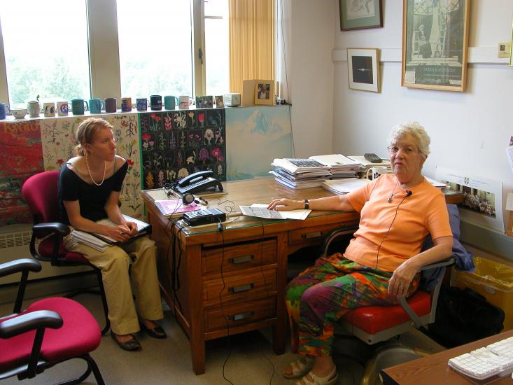 Vera Rubin is seated in her office with intern Ashley Yeager