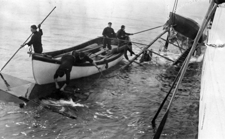 Photos of a wreckage of a rum runner, recovered by sailors