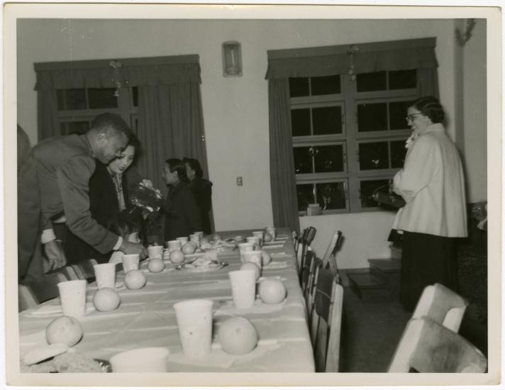 Ben Davis and Madame Chiang Kai-Shek at a party table