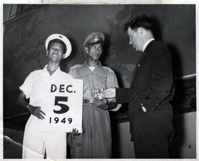 Lanphier and two local officials in Bangkok