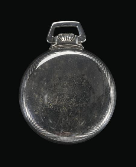 Back of watch with "Lindbergh" etched into the lower left hand side